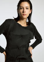 A model wears the A-POC ABLE ISSEY MIYAKE TYPE O 003 shirt.