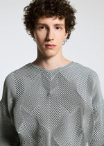 A model wears the APOCABLE TYPE O 010 prêt à porter.