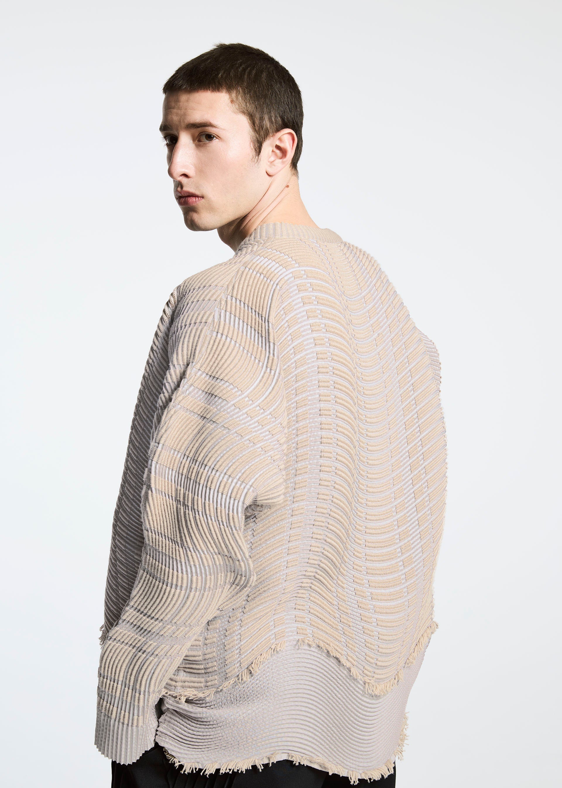 A model wears the APOCABLE TYPE W 010 prêt à porter.