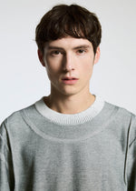 A model wears the A-POC ABLE ISSEY MIYAKE TYPE K 005 top.