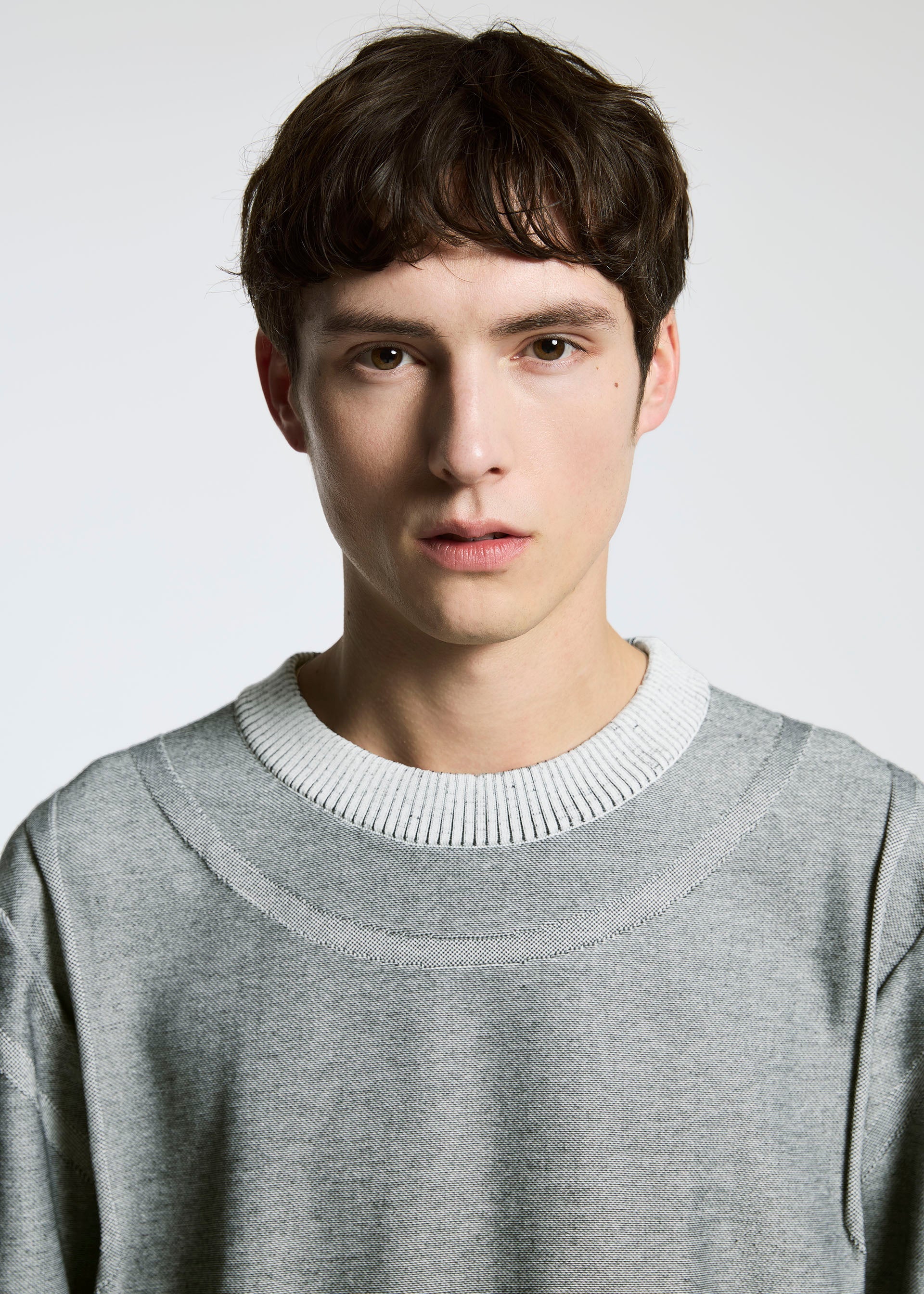 A model wears the A-POC ABLE ISSEY MIYAKE TYPE K 005 top.