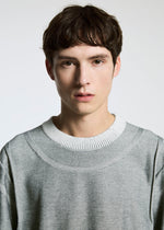 A model wears the A-POC ABLE ISSEY MIYAKE TYPE K 005 top.