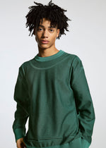 A model wears the A-POC ABLE ISSEY MIYAKE TYPE K 005 top.