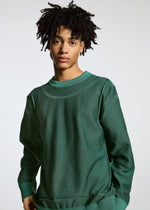 A model wears the A-POC ABLE ISSEY MIYAKE TYPE K 005 top.