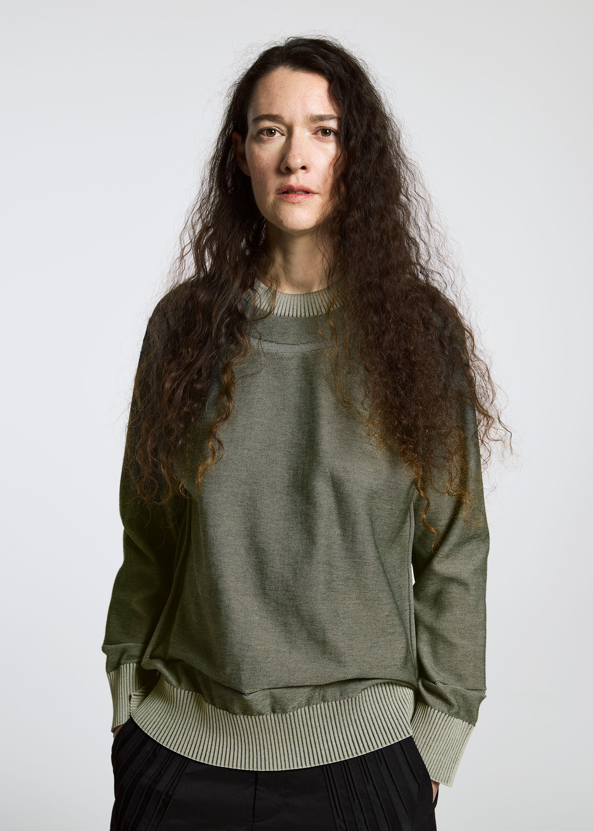 A model wears the A-POC ABLE ISSEY MIYAKE TYPE K 005 top.
