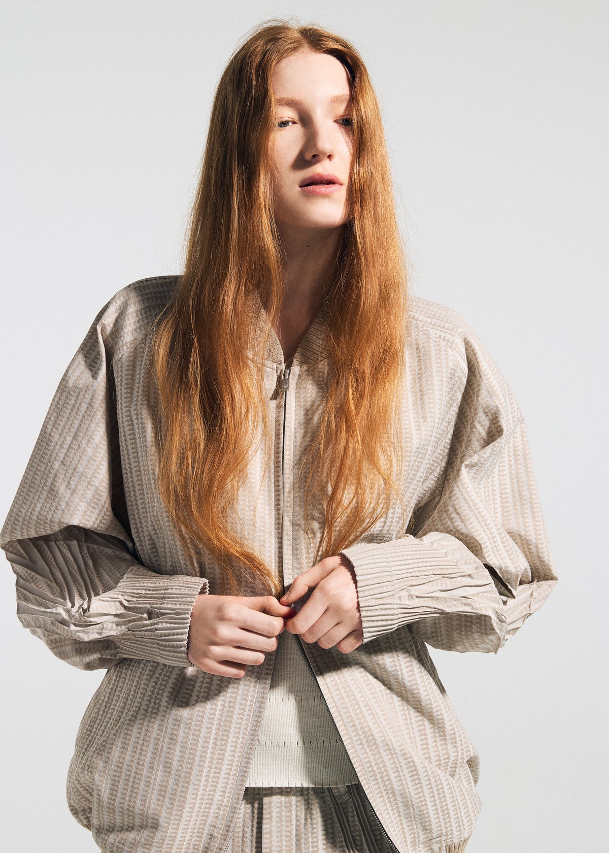 A model wears the A-Poc Able Issey Miyake TYPE S 001 1 blouson.