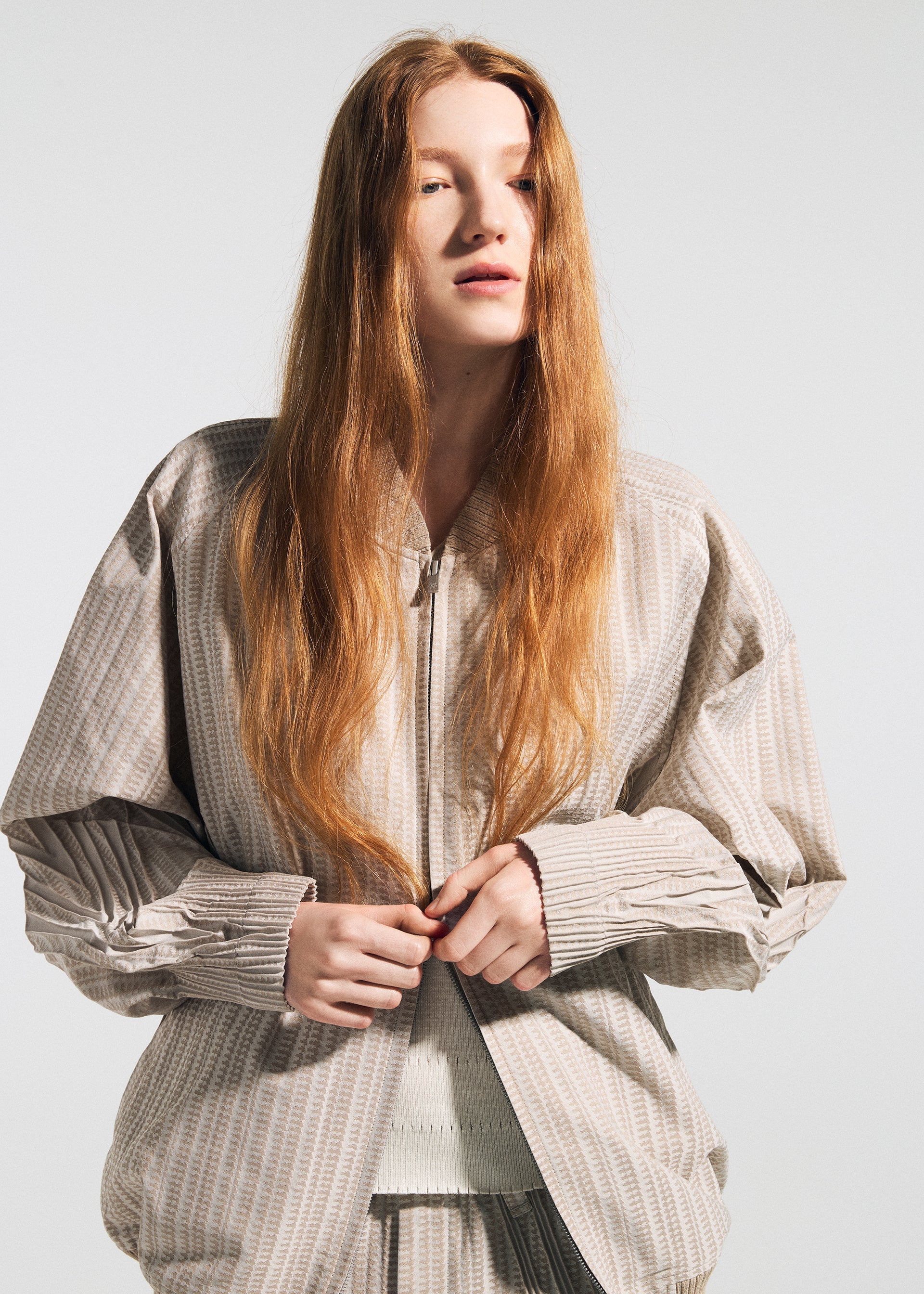 A model wears the A-Poc Able Issey Miyake TYPE S 001 1 blouson.