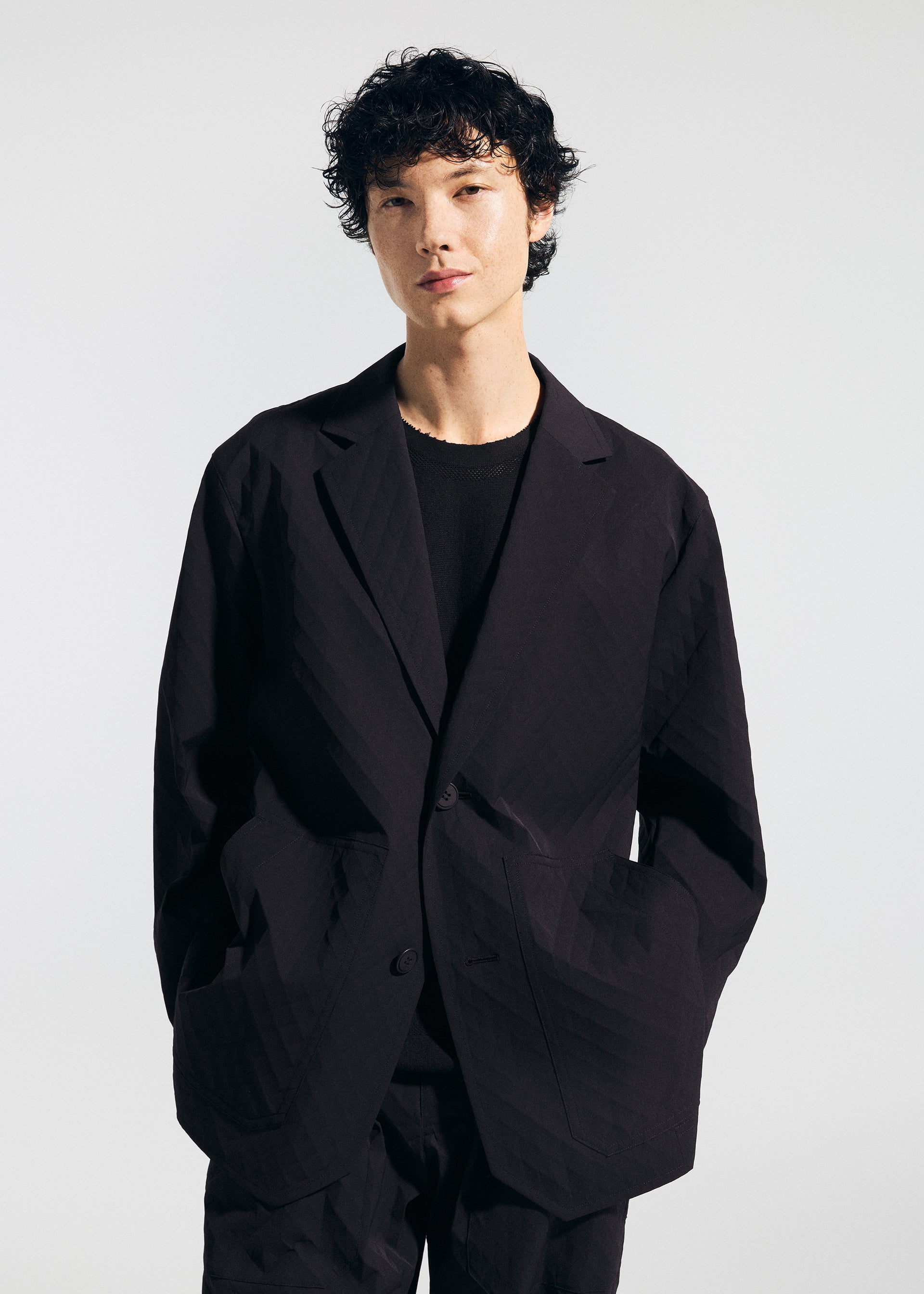 A model wears the A-Poc Able Issey Miyake TYPE T 001 2 prêt à porter.