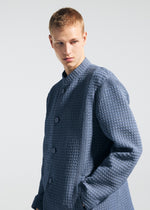 A model wears the A-POC ABLE ISSEY MIYAKE TYPE-O 014 type-o-014-jacket-black-6.