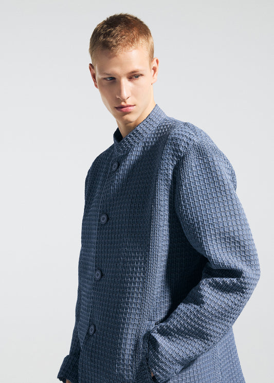 A model wears the A-POC ABLE ISSEY MIYAKE TYPE-O 014 type-o-014-jacket-steel-blue.