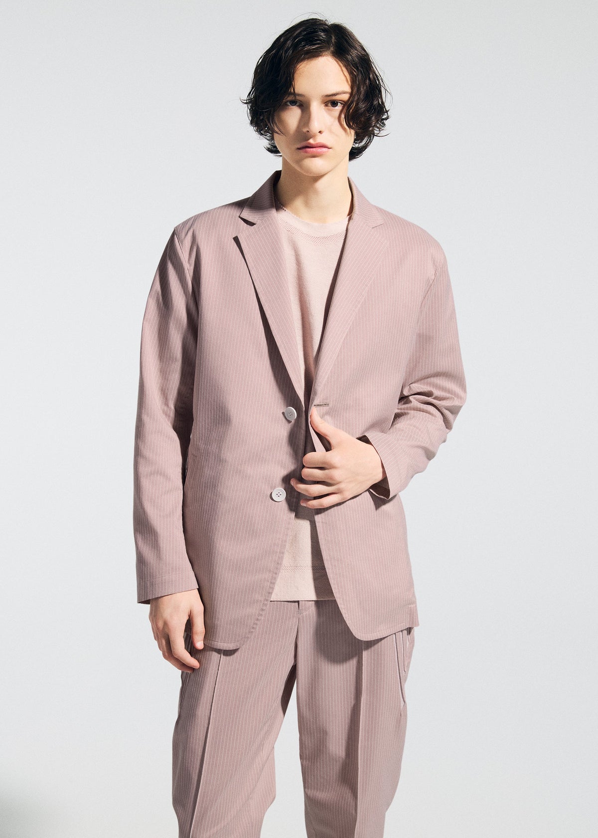A model wears the A-POC ABLE ISSEY MIYAKE TYPE-S 001-2 type-s-001-2-jacket-grey-hued.