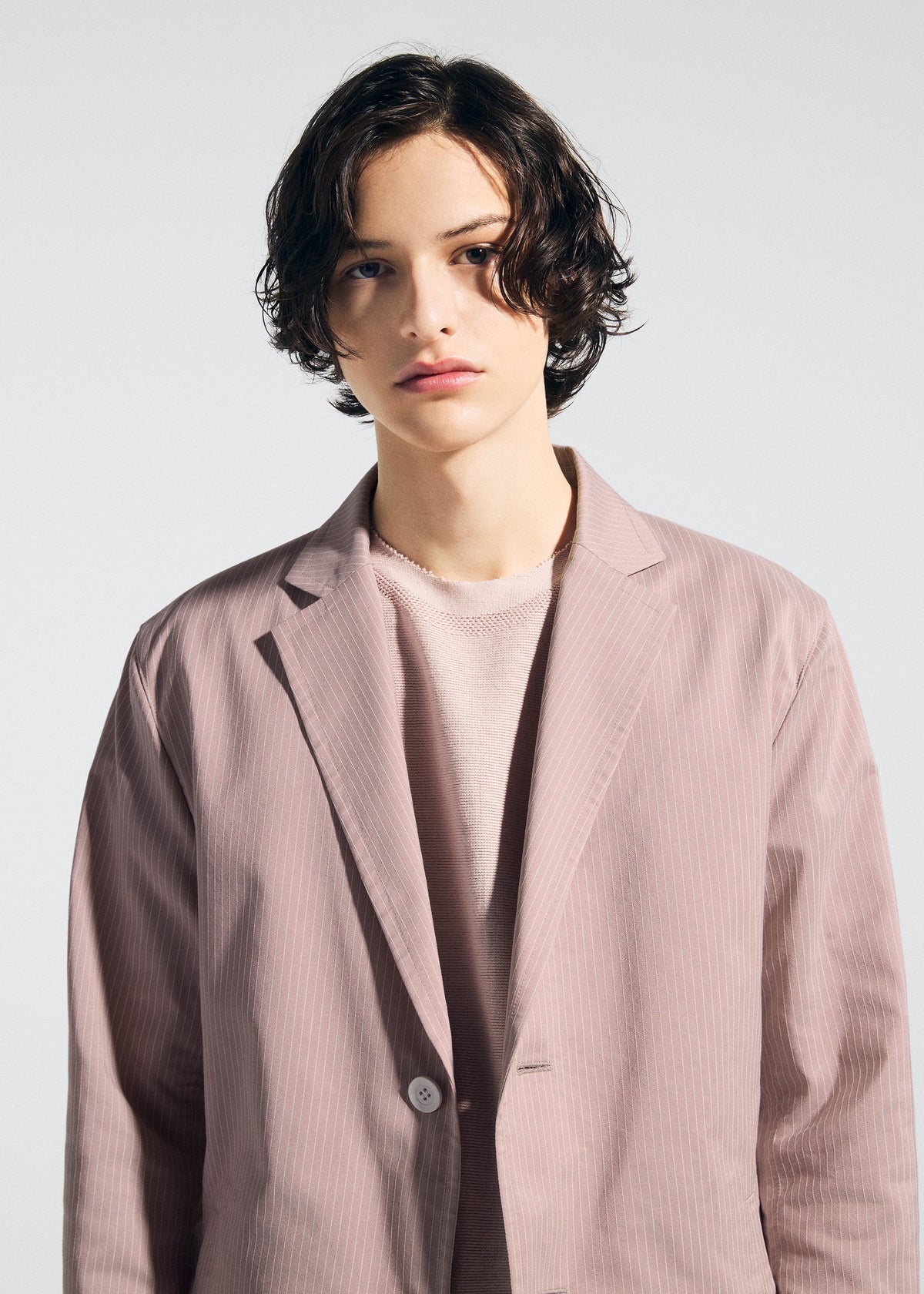 A model wears the A-POC ABLE ISSEY MIYAKE TYPE-S 001-2 type-s-001-2-jacket-grey-hued.