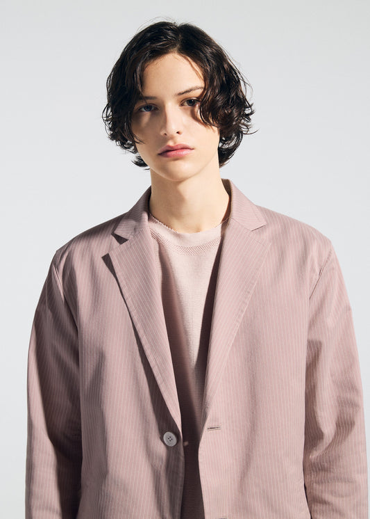 A model wears the A-POC ABLE ISSEY MIYAKE TYPE-S 001-2 type-s-001-2-jacket-grey-hued.