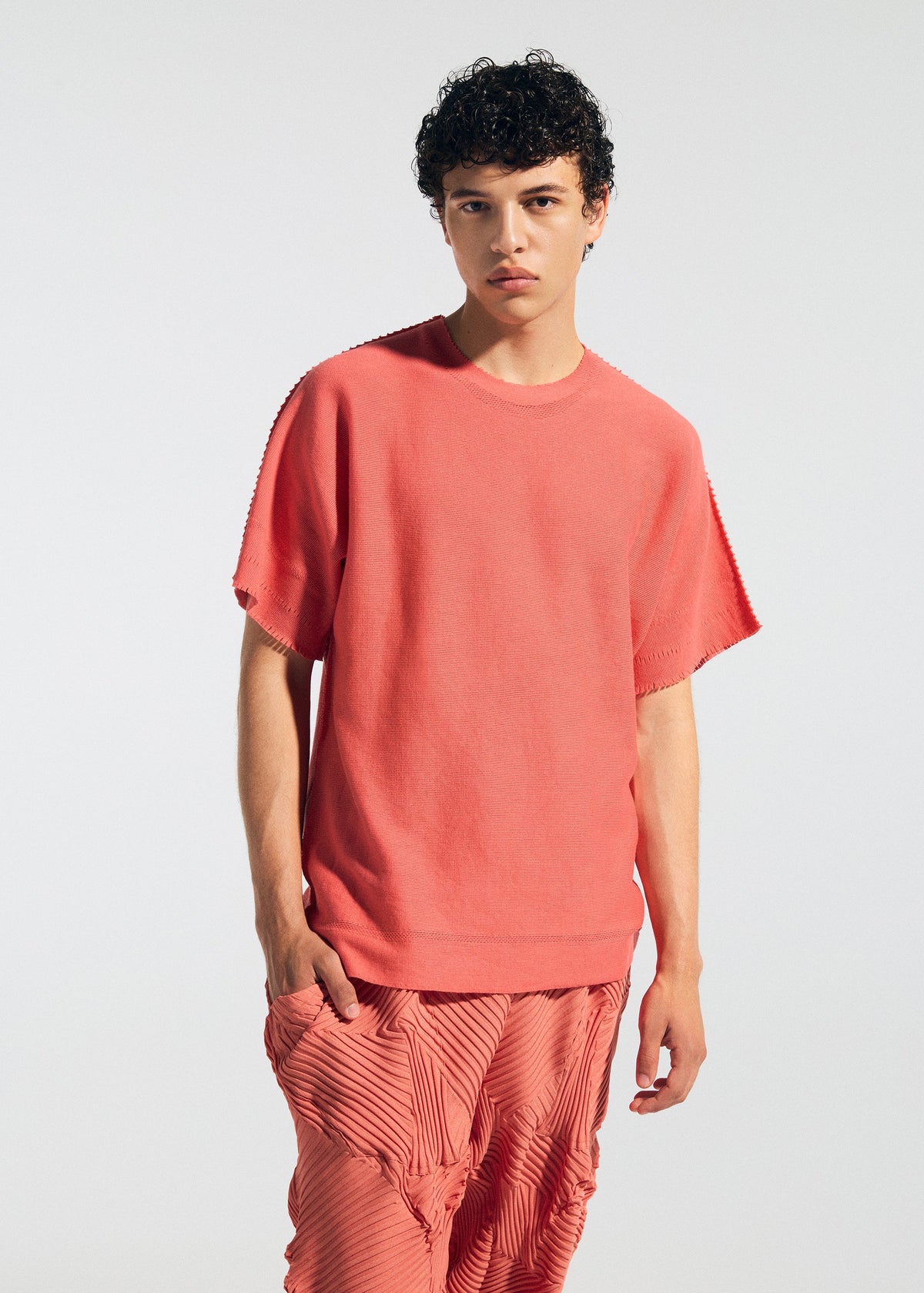 A model wears the A-Poc Able Issey Miyake TYPE P 003 1 pants.