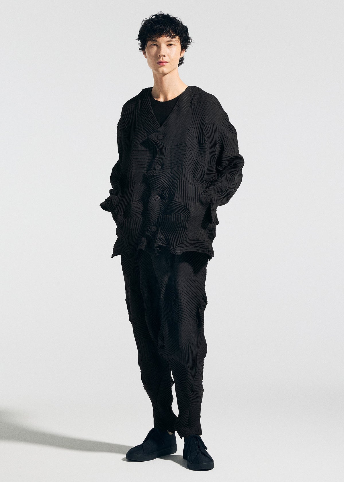 A model wears the A-Poc Able Issey Miyake TYPE P 003 1 pants.