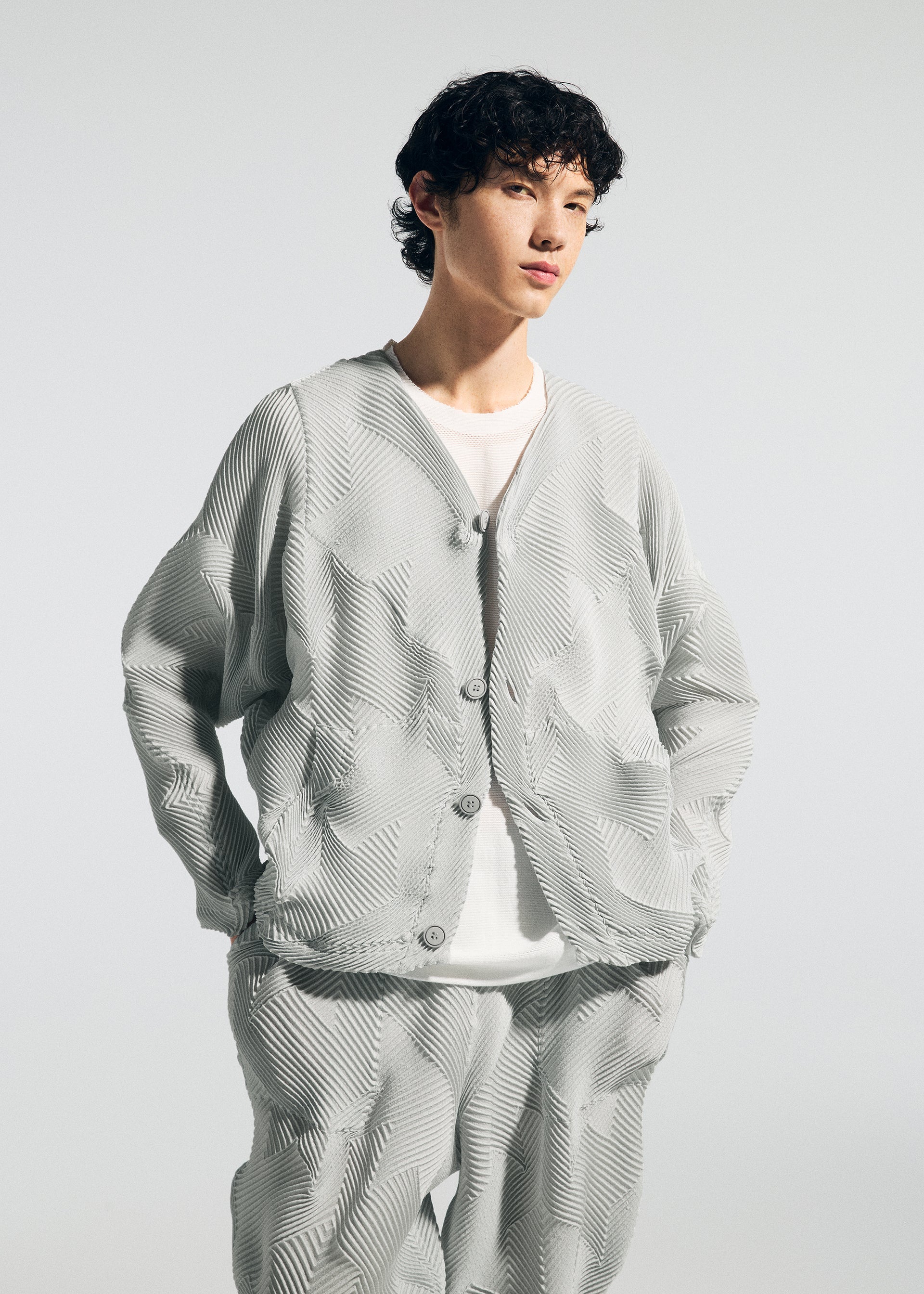A model wears the A-Poc Able Issey Miyake TYPE O 010 trousers.