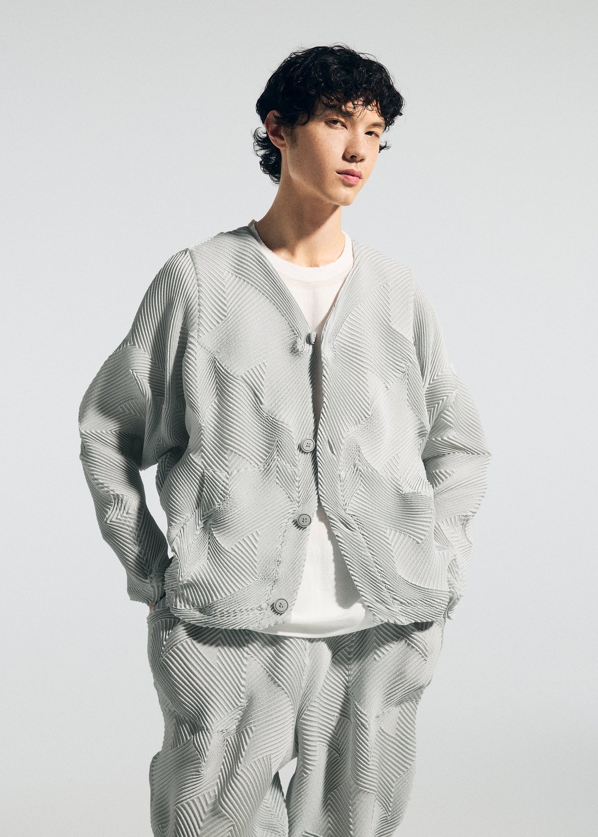 A model wears the A-Poc Able Issey Miyake TYPE O 010 trousers.