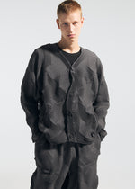 A model wears the A-Poc Able Issey Miyake TYPE O 010 trousers.