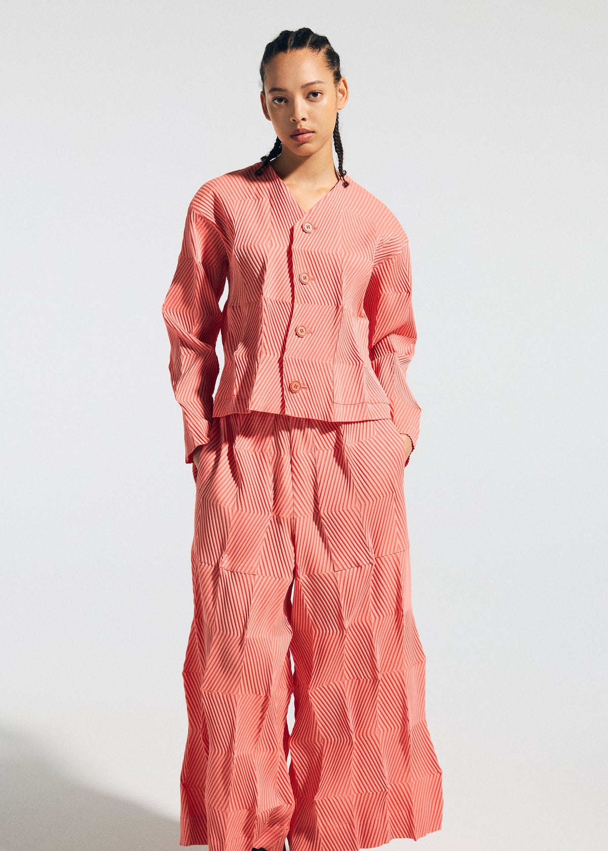 A model wears the A-Poc Able Issey Miyake TYPE W 009 1 pants.