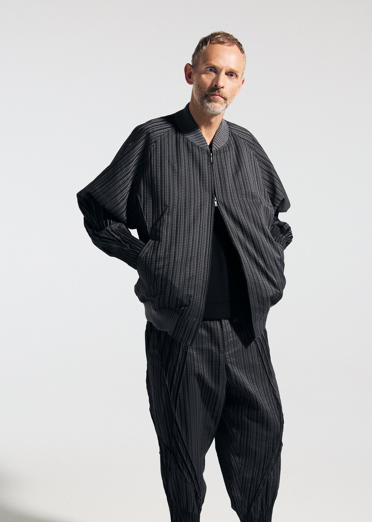 A model wears the A-Poc Able Issey Miyake TYPE S 001 1 pants.