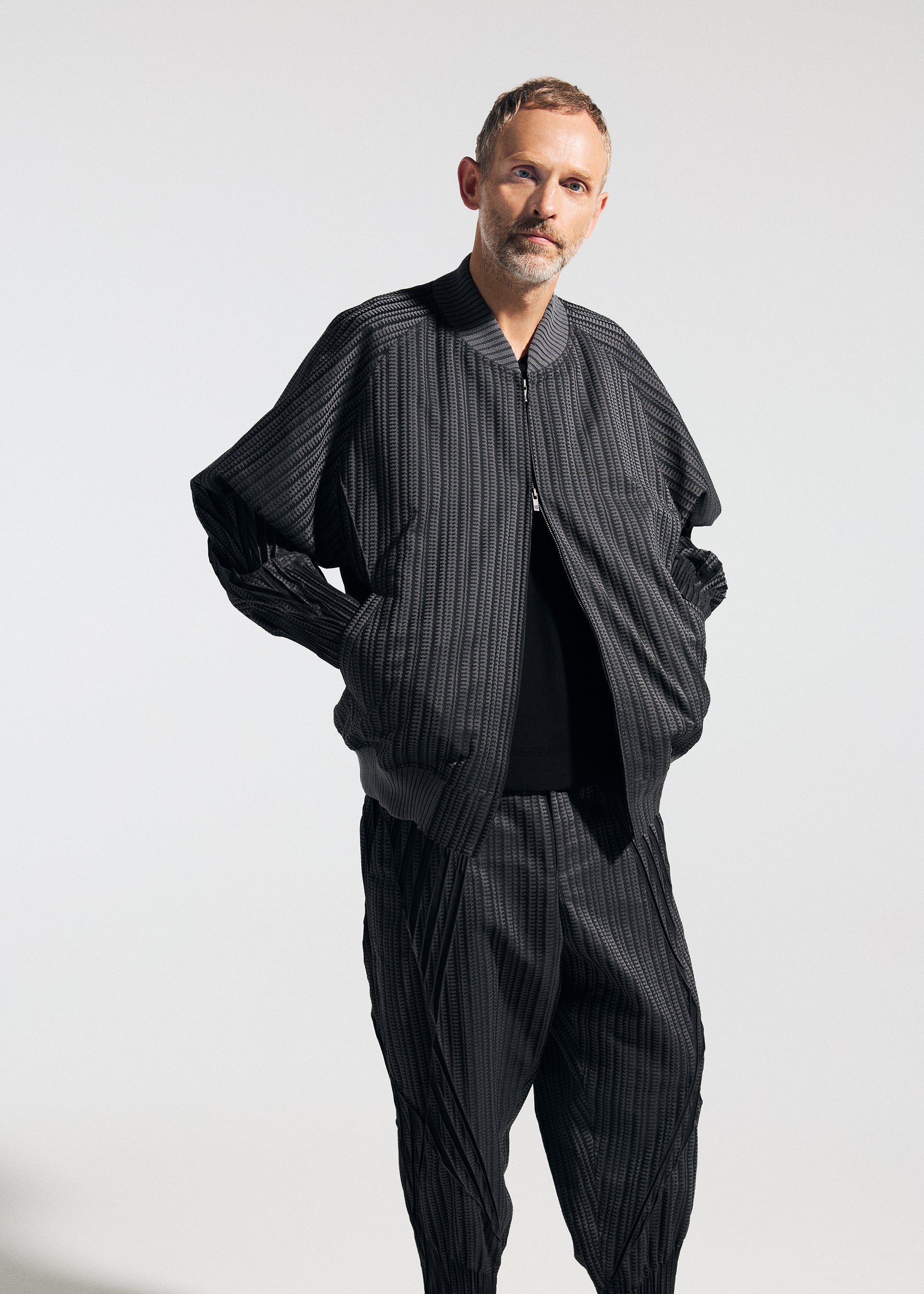 A model wears the A-Poc Able Issey Miyake TYPE S 001 1 pants.