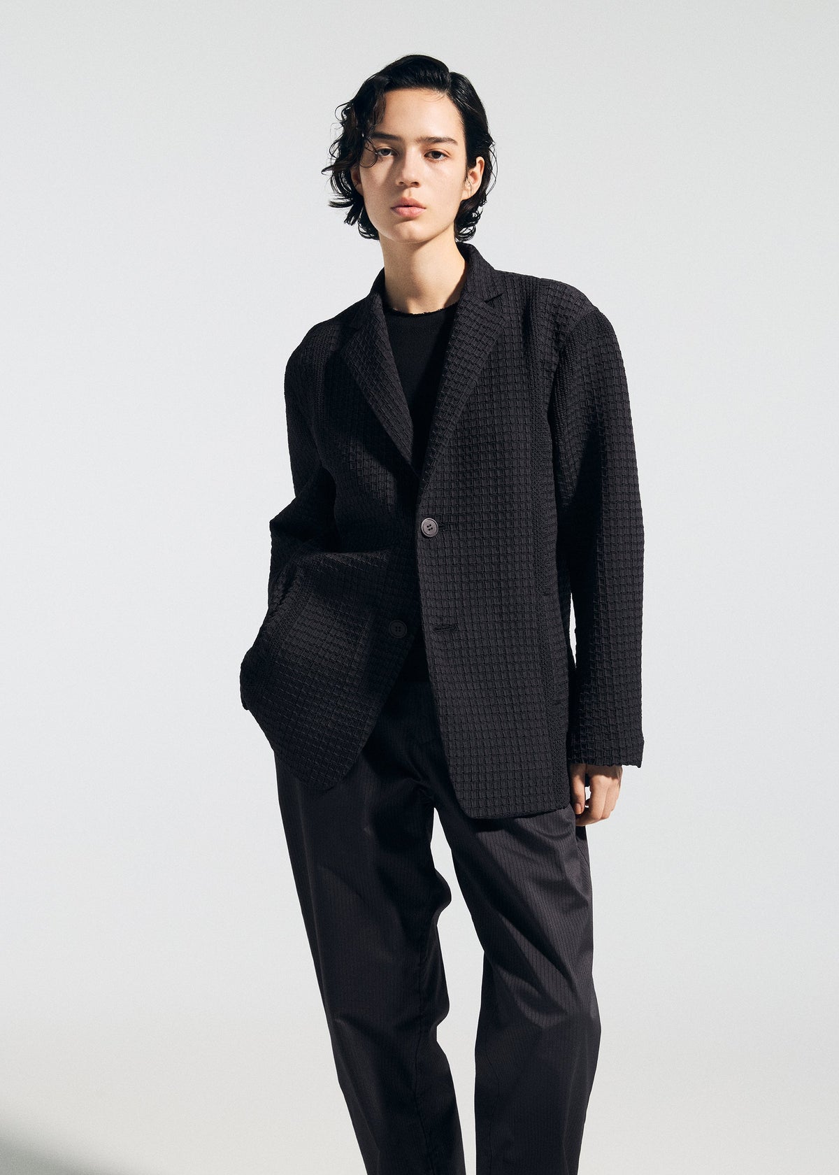 A model wears the A-POC ABLE ISSEY MIYAKE TYPE-S 003 type-s-003-pants-black.