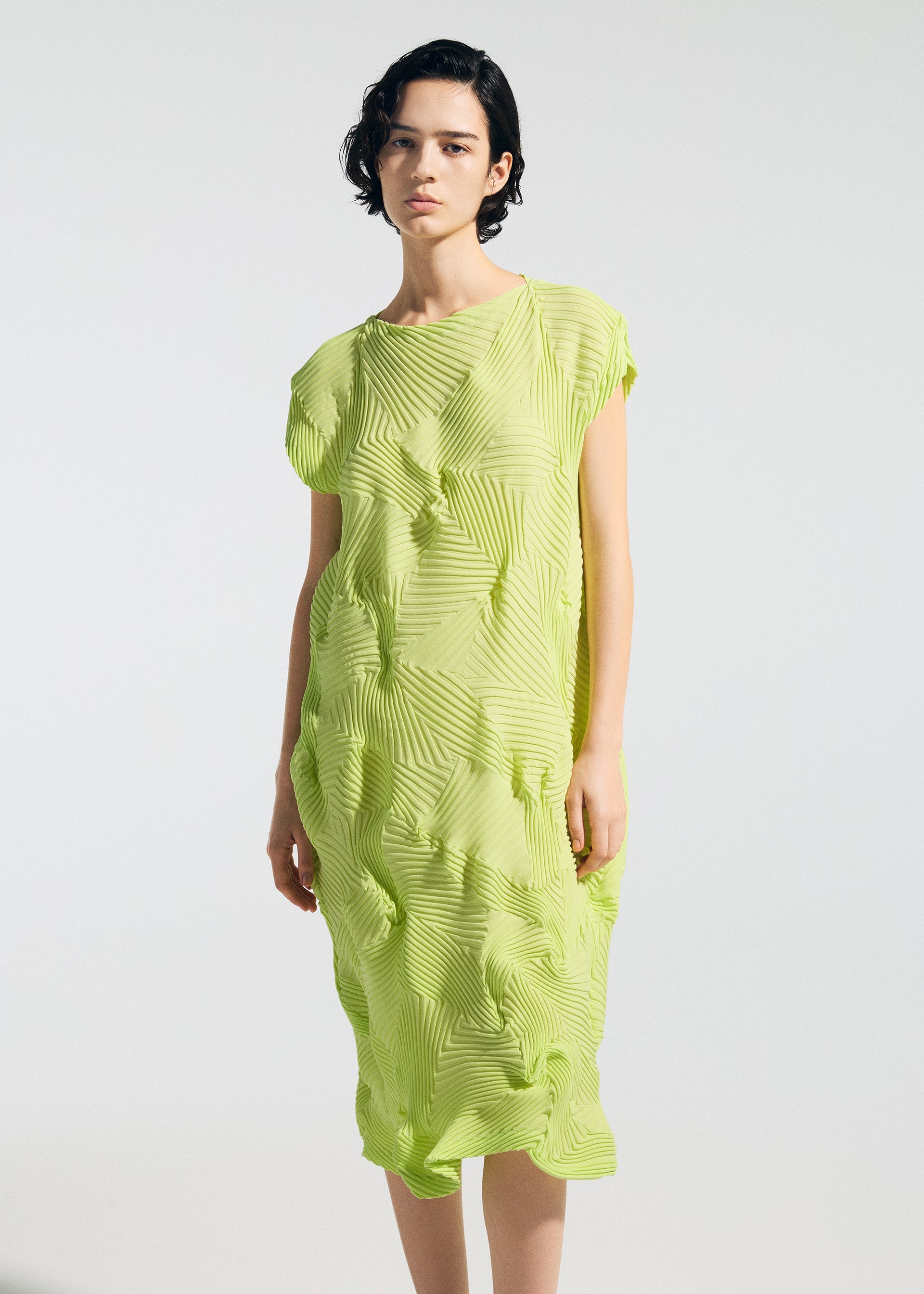 A model wears the A-POC ABLE ISSEY MIYAKE TYPE-P 003-2 type-p-003-2-dress-lime-green.
