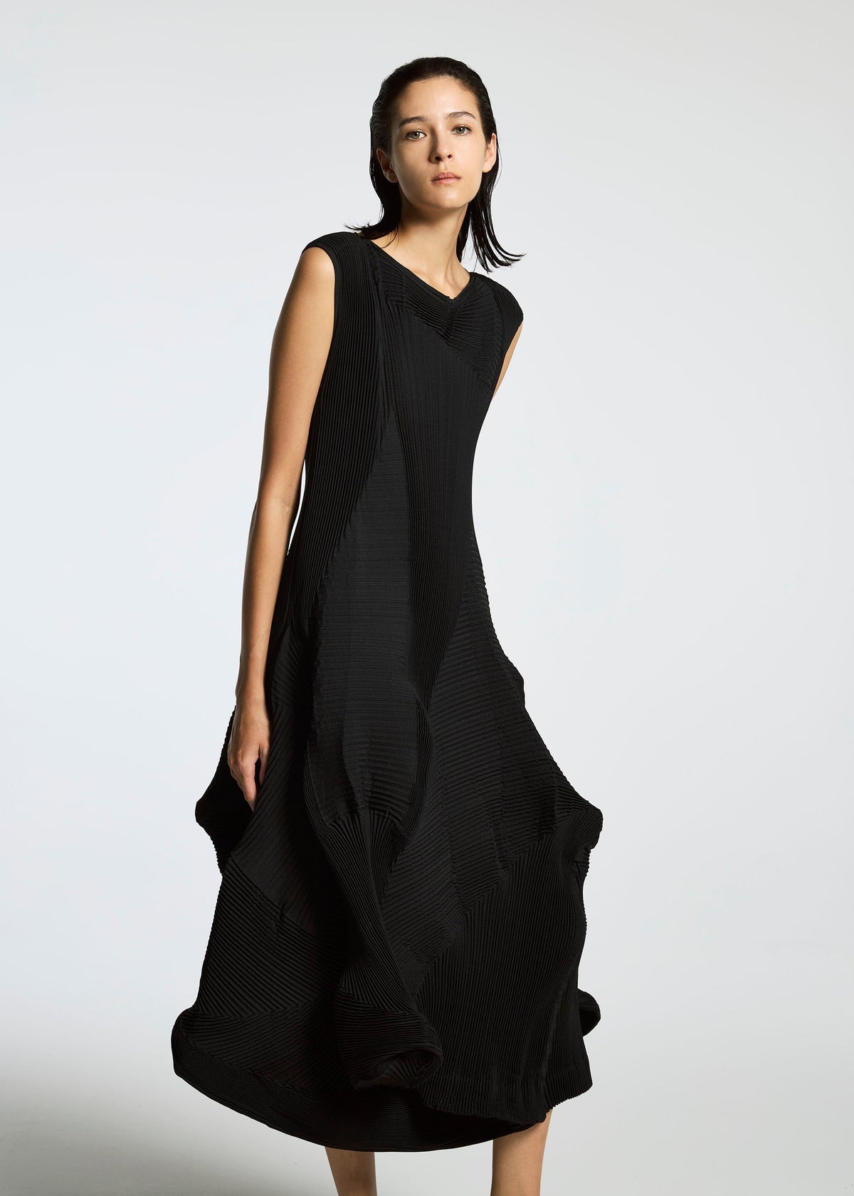A model wears the A-Poc Able Issey Miyake TYPE I 008 dress.