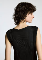 A model wears the A-Poc Able Issey Miyake TYPE I 008 dress.