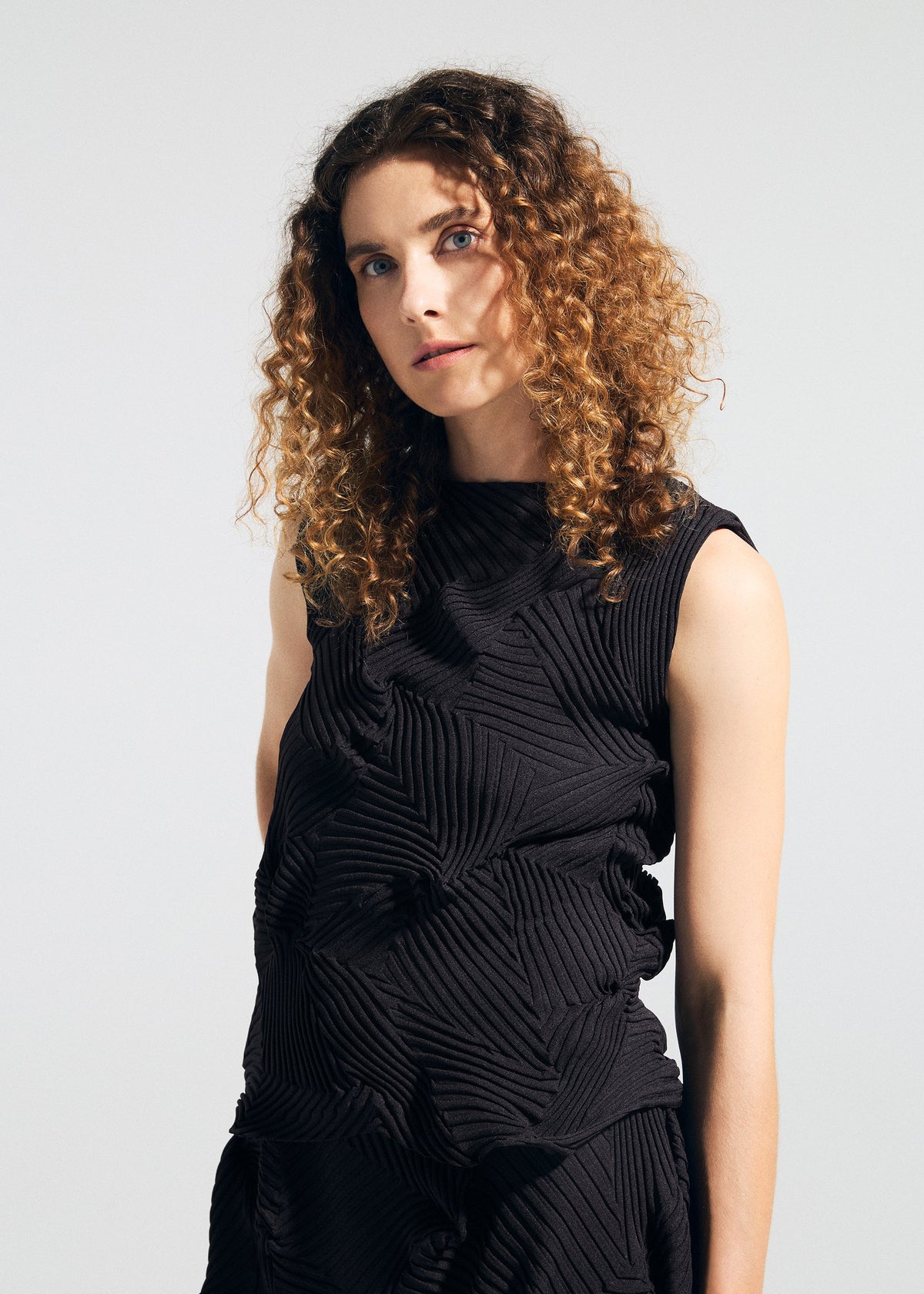 A model wears the A-POC ABLE ISSEY MIYAKE TYPE-P 003-2 type-p-003-2-shirt-black.