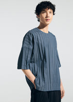 A model wears the A-Poc Able Issey Miyake TYPE W 007 shirt.