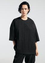A model wears the A-Poc Able Issey Miyake TYPE W 007 shirt.