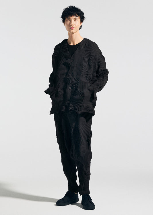 A model wears the A-Poc Able Issey Miyake TYPE P 003 1 cardigan.