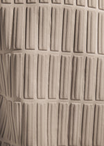 A model wears the A-Poc Able Issey Miyake TYPE E 001 pants.