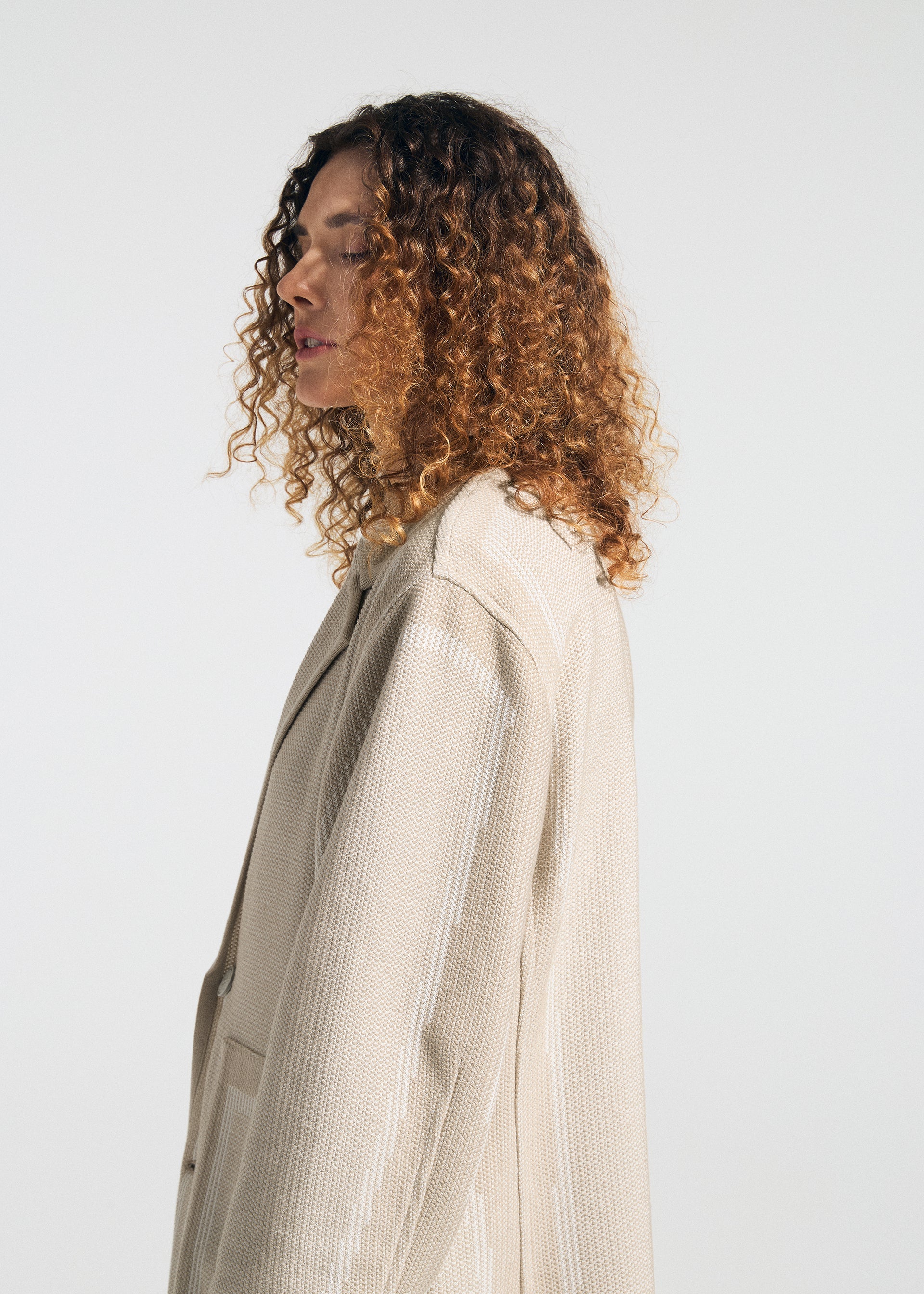 A model wears the A-Poc Able Issey Miyake TYPE K 008 jacket.