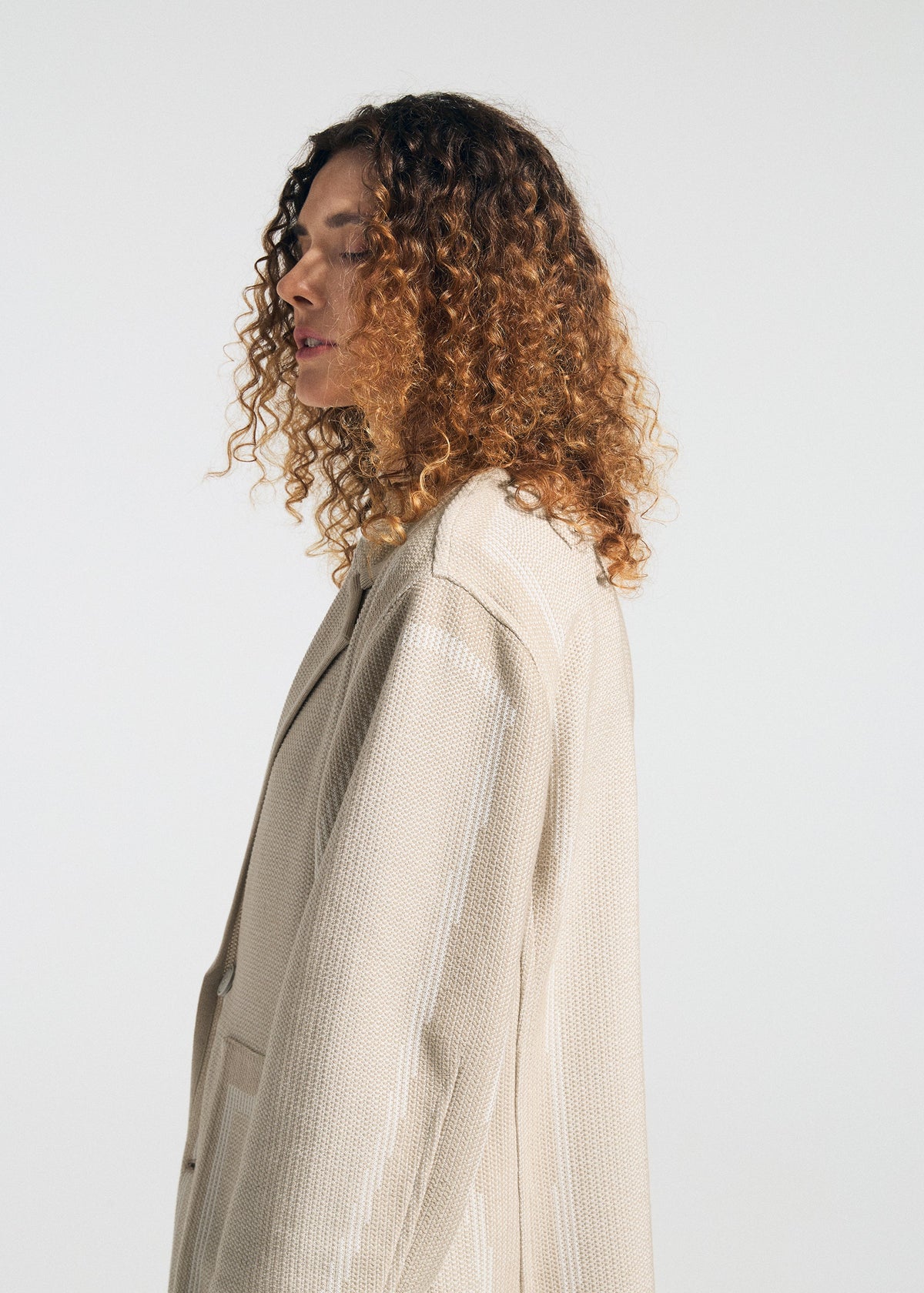 A model wears the A-Poc Able Issey Miyake TYPE K 008 jacket.