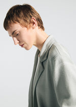 A model wears the A-Poc Able Issey Miyake TYPE K 008 jacket.