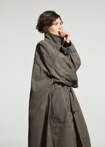 A model wears the A-POC ABLE ISSEY MIYAKE TYPE-U 001-1 coat.