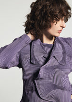 A model wears the A-POC ABLE ISSEY MIYAKE TYPE-O 003-1 jacket.