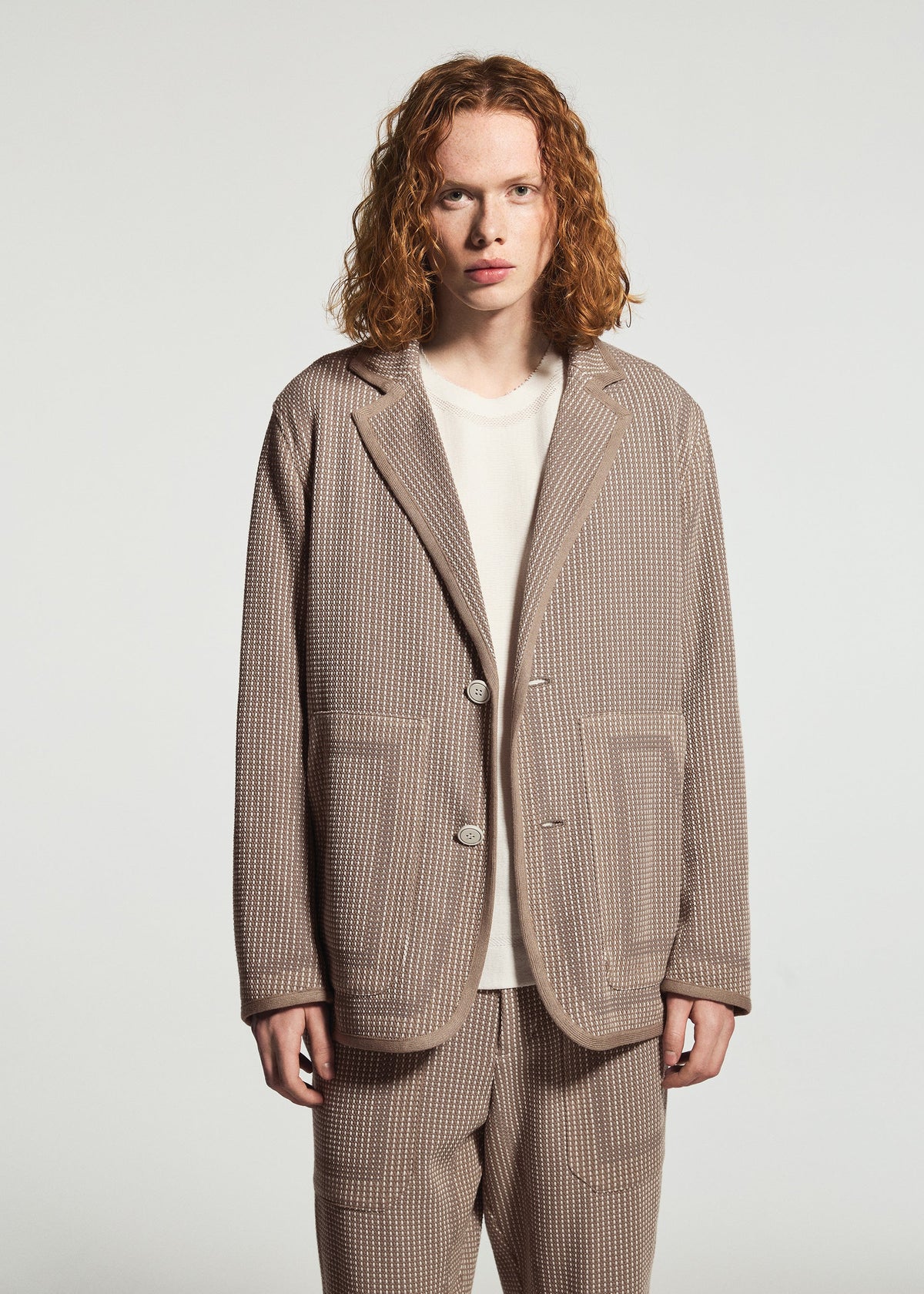 A model wears the A-POC ABLE ISSEY MIYAKE TYPE-K 012 jacket.