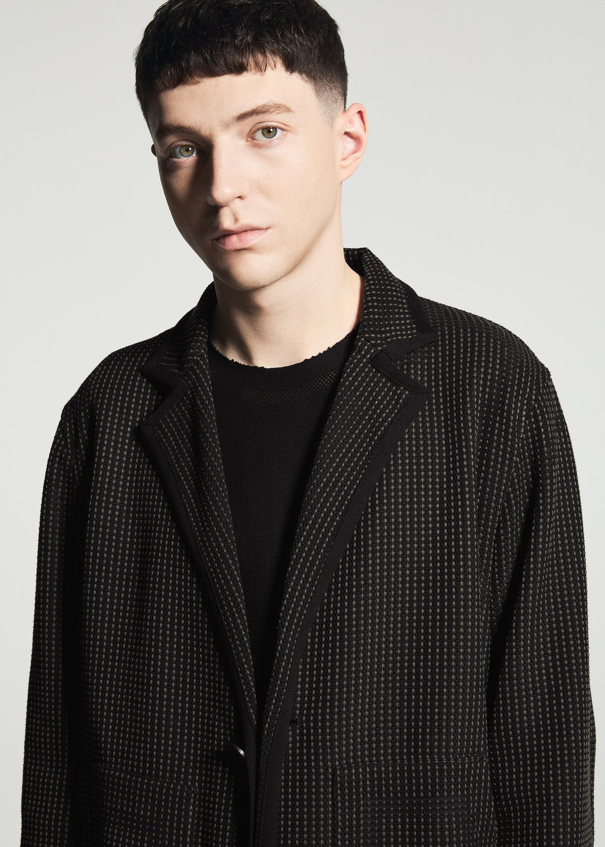 A model wears the A-POC ABLE ISSEY MIYAKE TYPE-K 012 jacket.