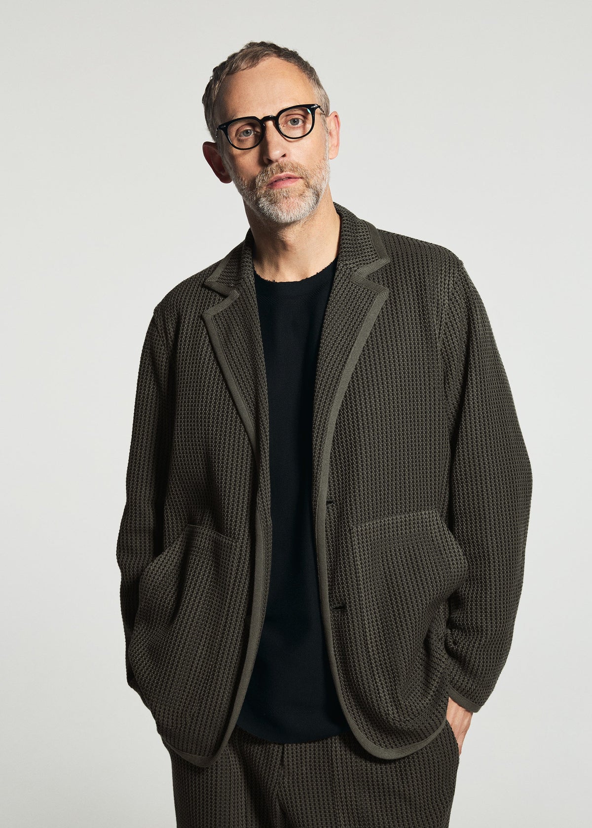 A model wears the A-POC ABLE ISSEY MIYAKE TYPE-K 012 jacket.