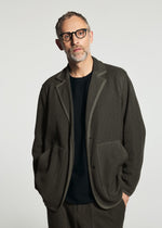 A model wears the A-POC ABLE ISSEY MIYAKE TYPE-K 012 jacket.