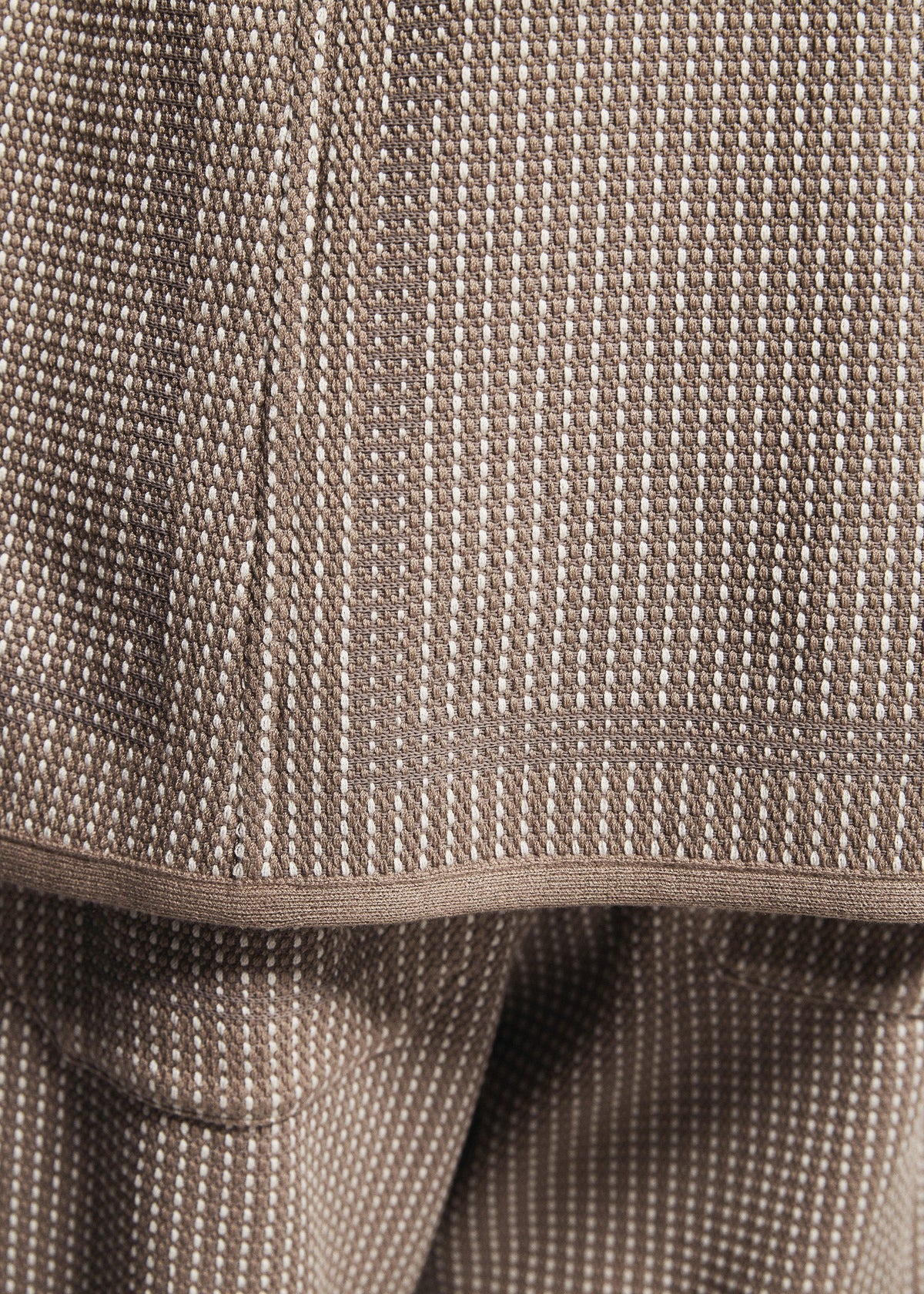 A model wears the A-POC ABLE ISSEY MIYAKE TYPE-K 012 trousers.