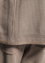 A model wears the A-POC ABLE ISSEY MIYAKE TYPE-K 012 trousers.