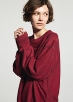 A model wears the A-POC ABLE ISSEY MIYAKE TYPE-K 010 top.