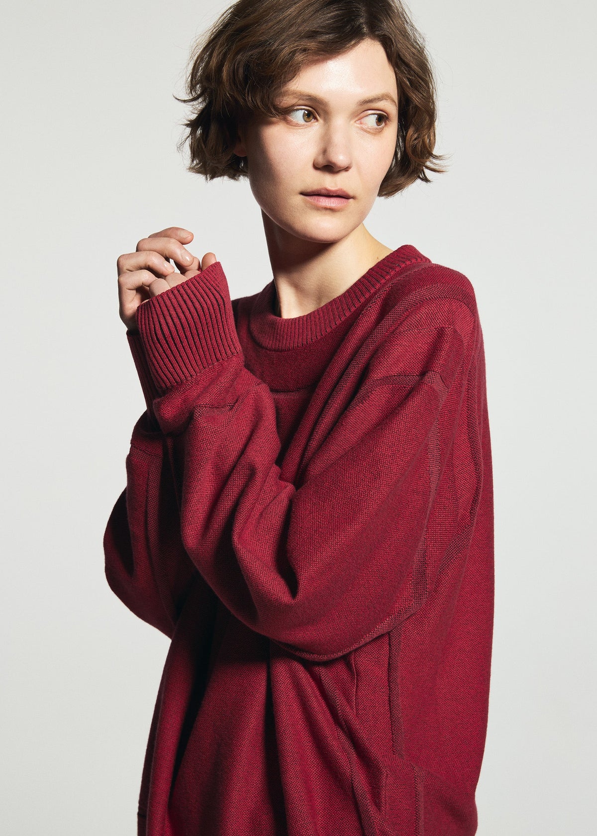 A model wears the A-POC ABLE ISSEY MIYAKE TYPE-K 010 top.
