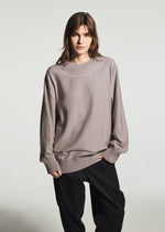 A model wears the A-POC ABLE ISSEY MIYAKE TYPE-K 010 top.
