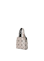 A detail shot of the Bao Bao Issey Miyake CARAT handbag.