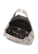 A detail shot of the Bao Bao Issey Miyake CARAT handbag.